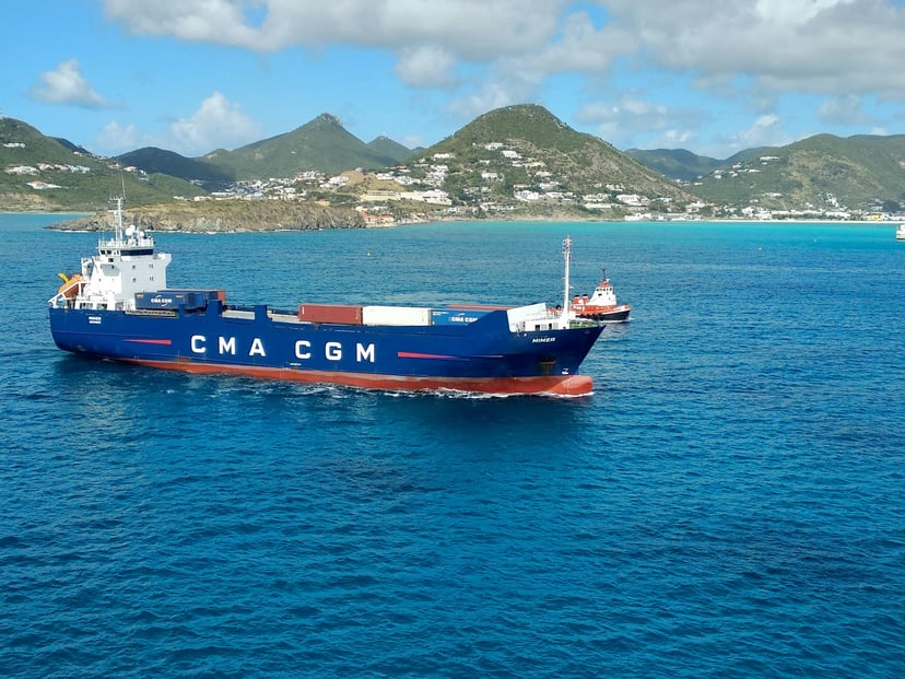 A CMA CGM container feeder vessel at sea
