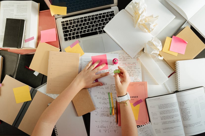 desk covered in files