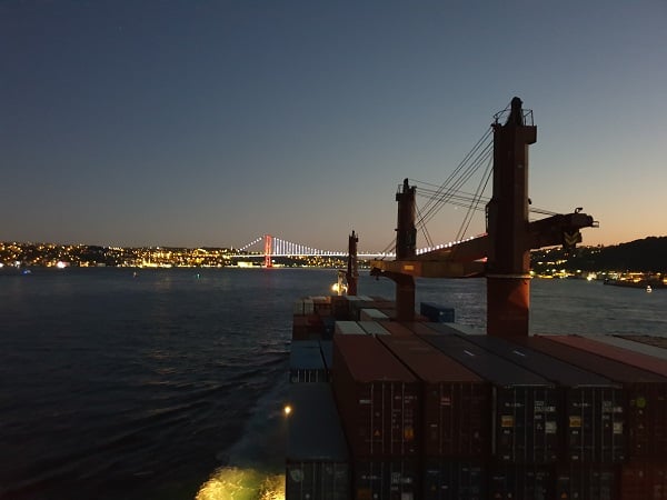 Vessel sailing the Bosphorus Strait at dusk