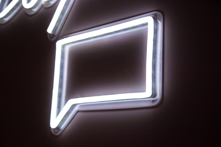 white neon message icon