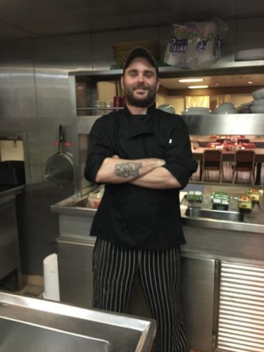 the chef in the galley of a container ship