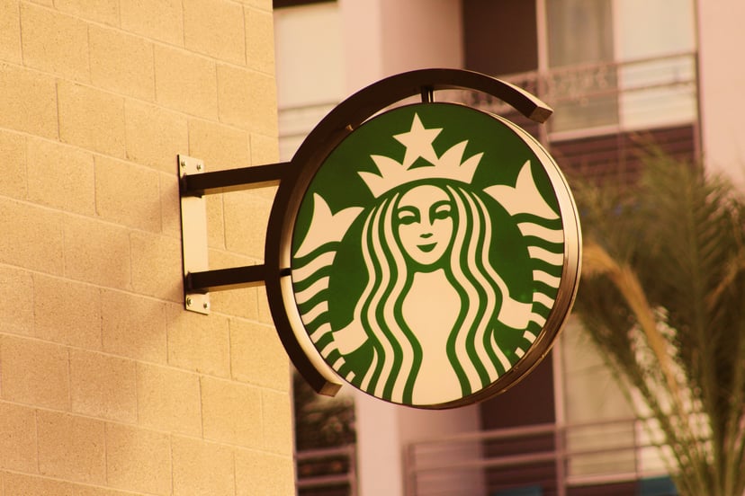 the Starbucks logo on an exterior sign