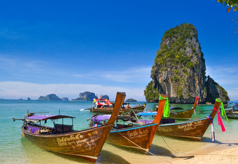 Wooden longtail boats on a Phuket beach, Thailand