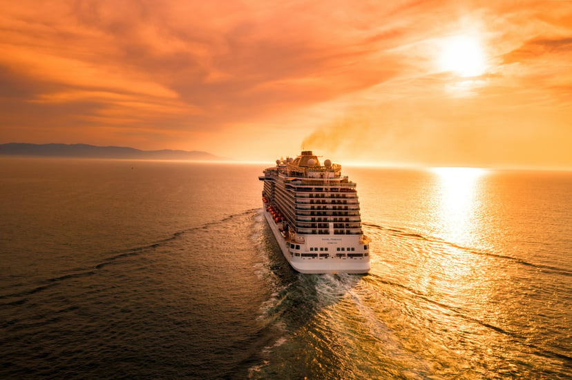 The Royal Princess at sea at sunset