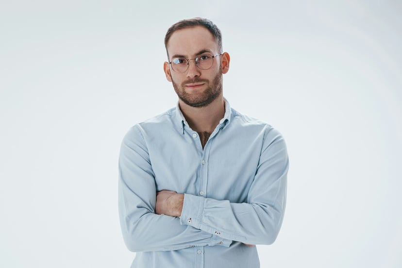 man with his arms crossed