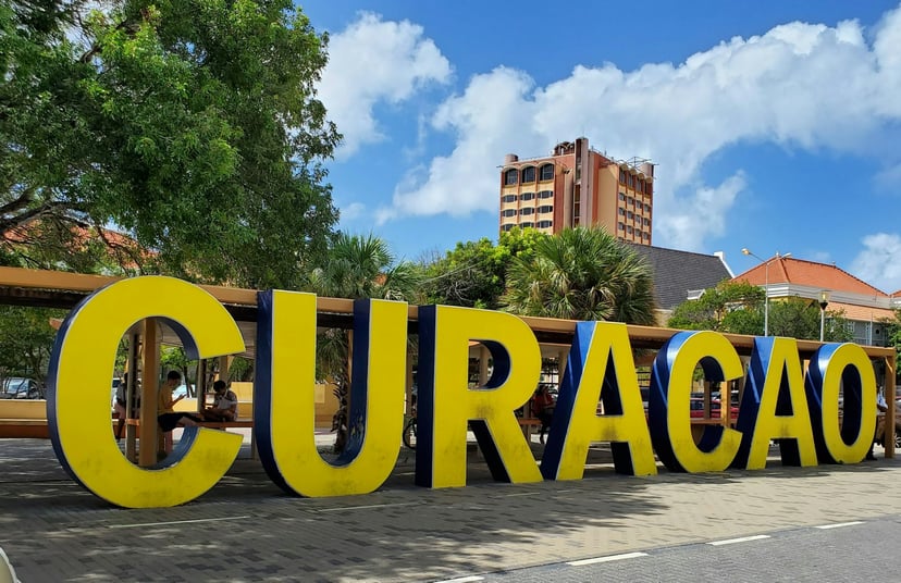 A sign saying Curacao on the island of Curacao