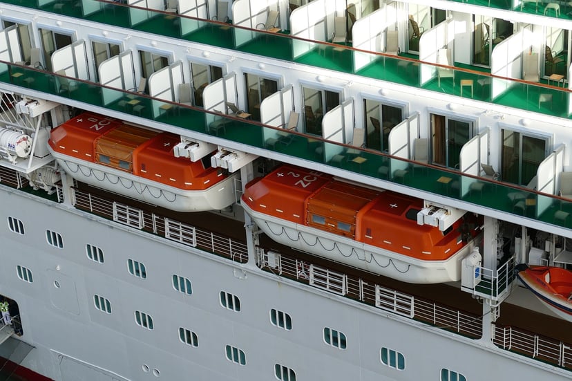 A close up of balconies and lifeboats on a P&O cruise ship