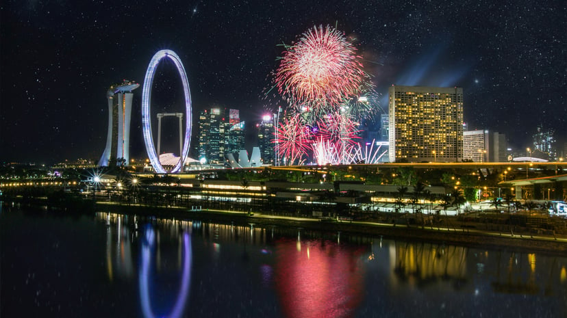 A firework display over Singapore's marina at night