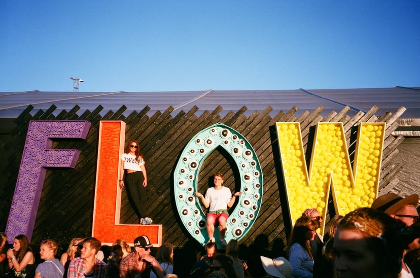 The word 'flow' in giant colorful letters