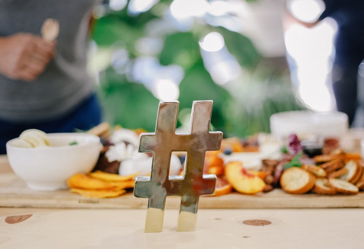 a gold hashtag shaped ornament