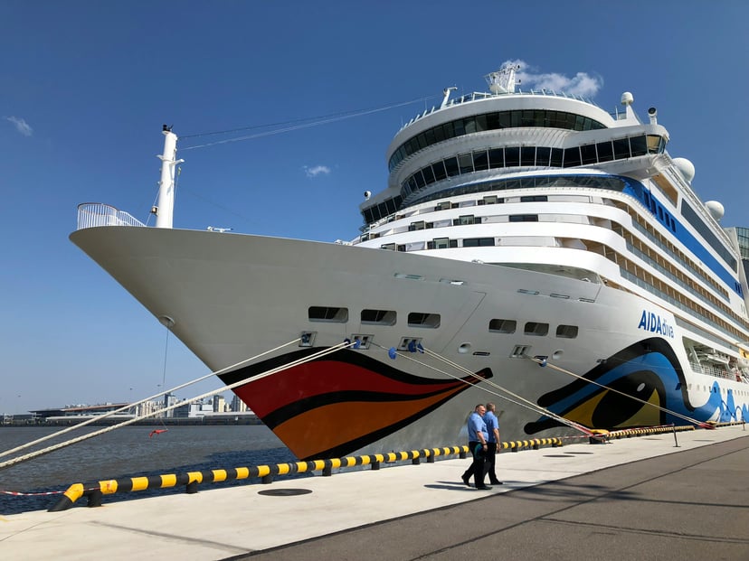 The AIDAdiva cruise ship docked in a port
