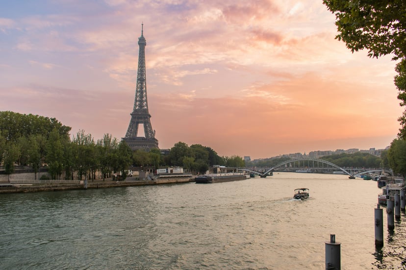The River Seine and Eiffel Tower in Paris at sunset