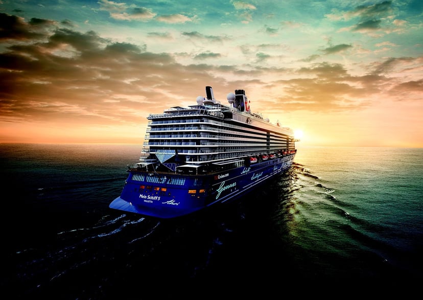 Tui's cruise ship, the Mein Schiff 5 at sunset