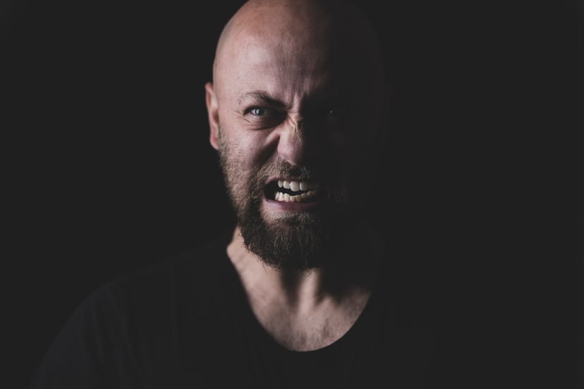 angry man baring his teeth