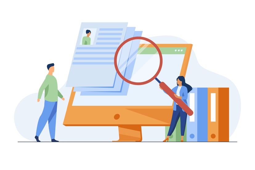 CVs on a computer screen and a woman holding a magnifying glass in front of them