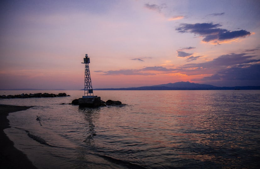 A nautical bouy at sunset