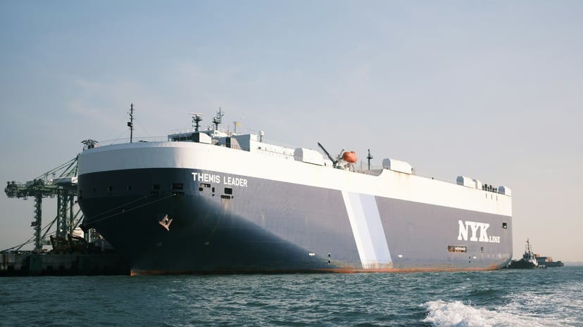 An NYK car carrier vessel in port