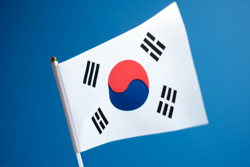 The flag of South Korea against a blue background