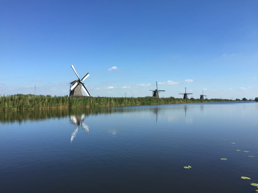 Windmills lining the banks of the Noord River near Alblasserdam, Netherlands