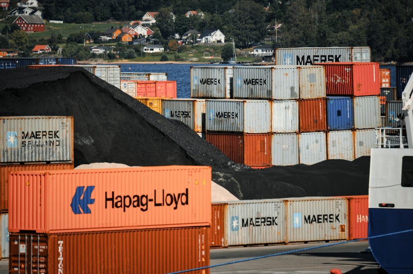 Hapag Lloyd and Maersk shipping containers