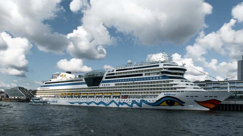 The AIDAmar cruise ship docked in a port