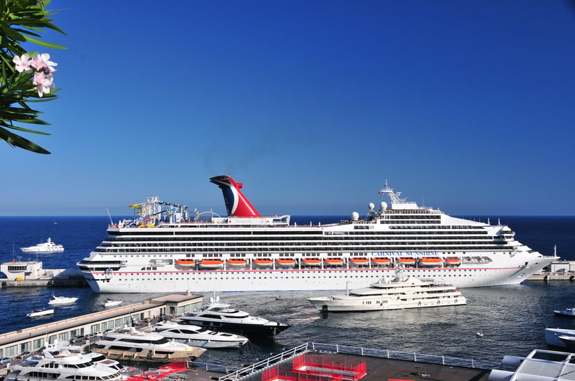 The Carnival Sunshine cruise ship in a tropical destination