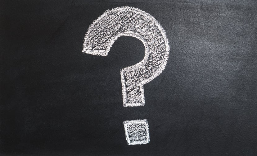 A question mark drawn on a chalkboard