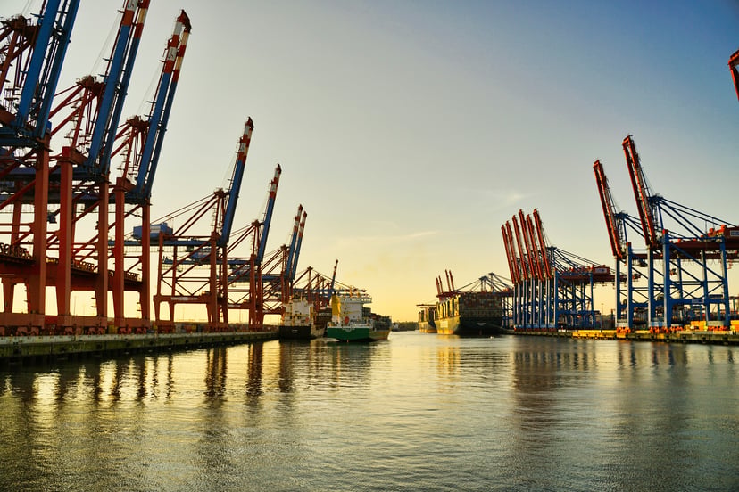 A container ship in the Port of Hamburg, Germany at sundwon