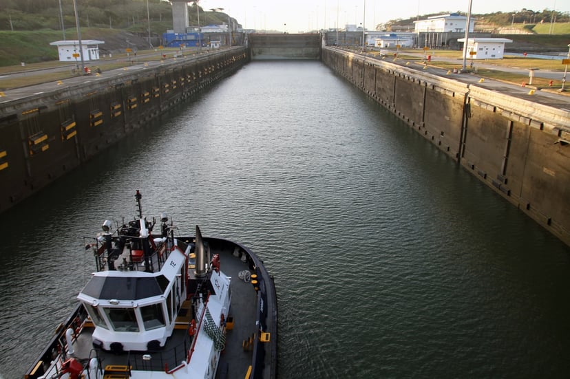 A small boat traversing the Panama Canal