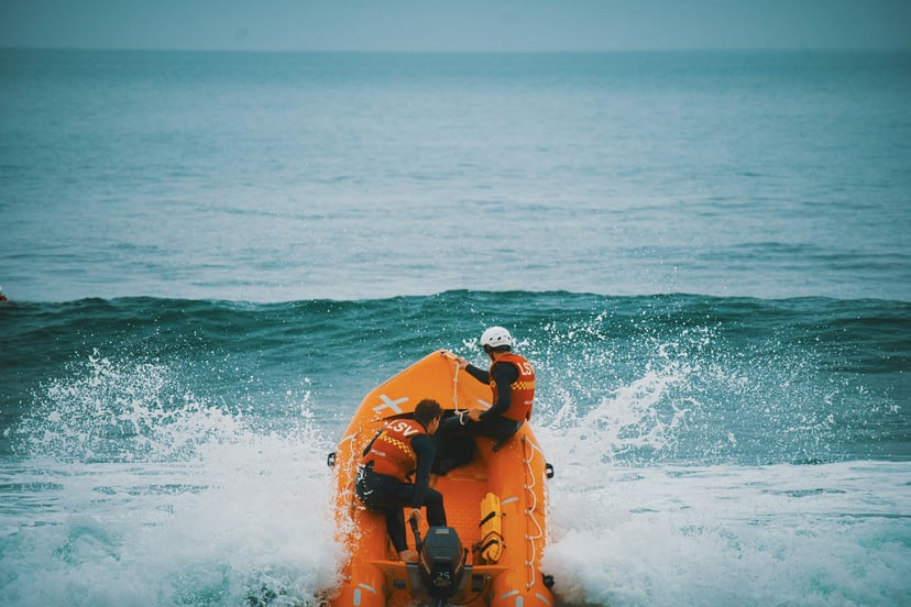 An orange rescue boat at sea