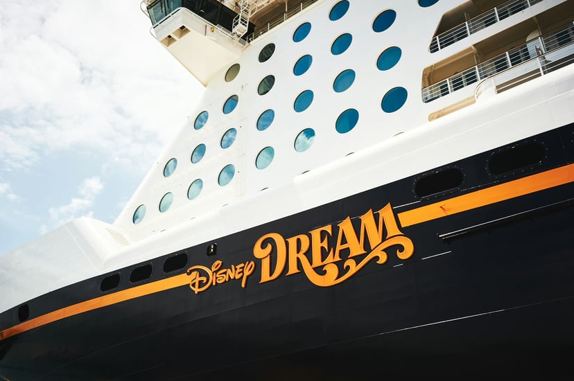 The hull of the Disney Deam cruise ship showing its name