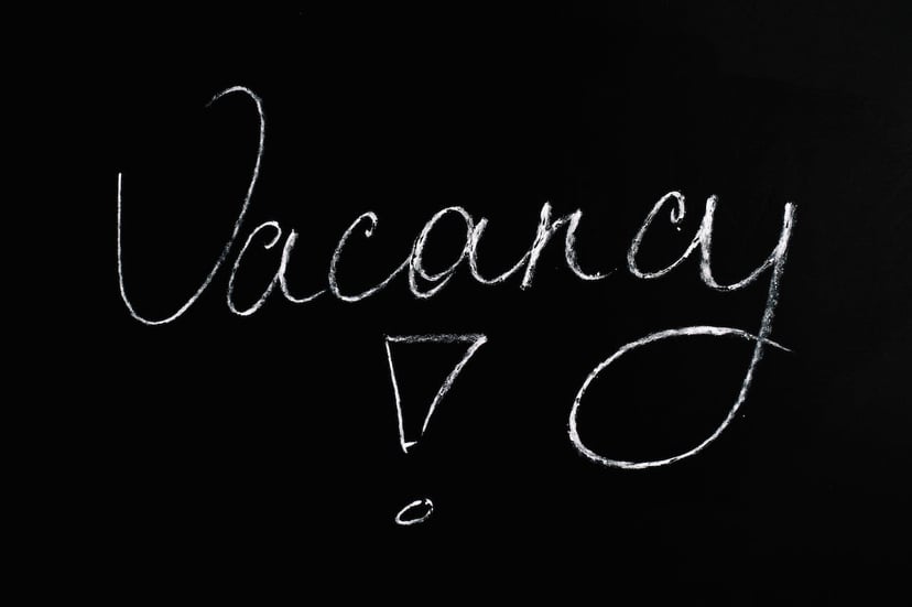 The word 'vacancy' written on a chalkboard