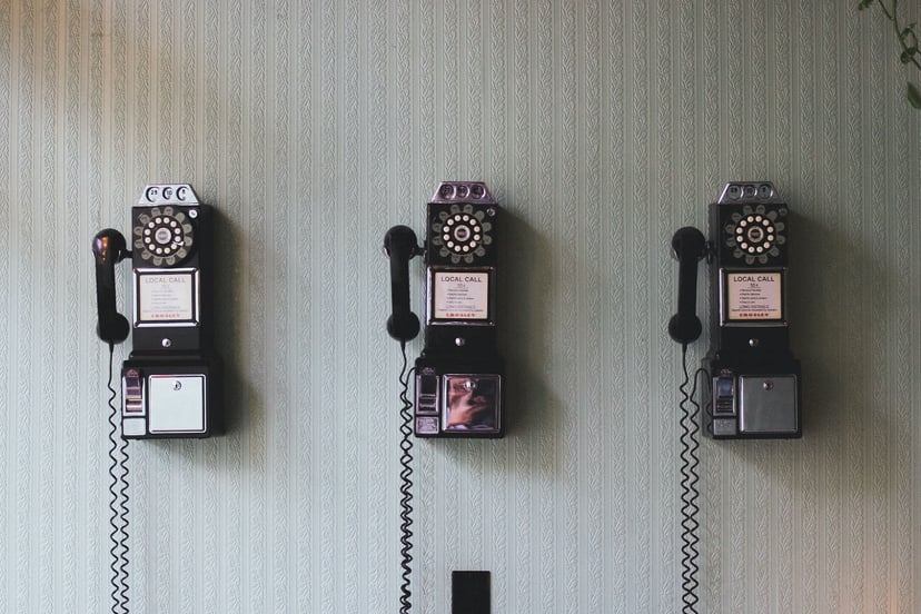 3 old fashioned wall mounted phones