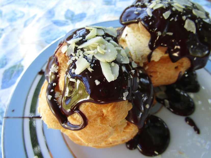 Two profiteroles on a plate