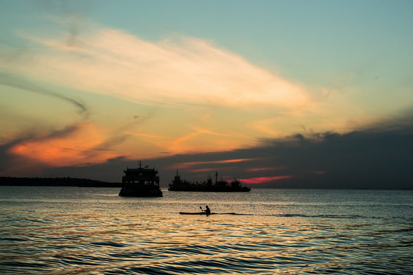 Vessels off the coast of Sudan at sunset