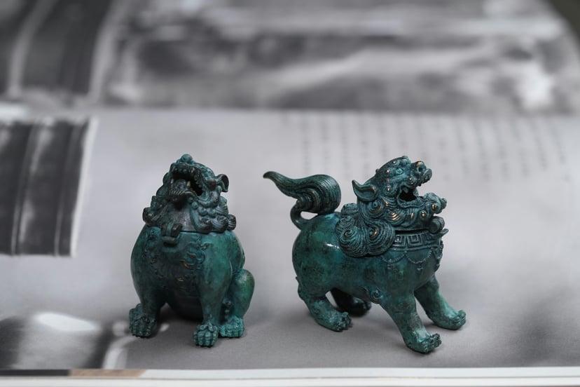 Two Chinese jade lion sculptures