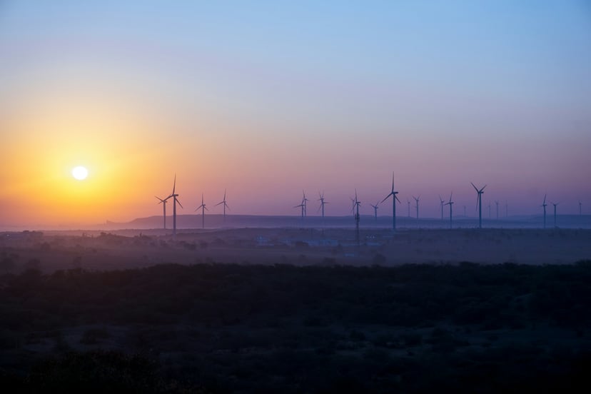 An offshore windfarm at dusk