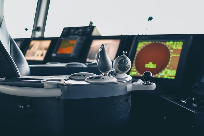 screens and controls on a cruise ship's bridge