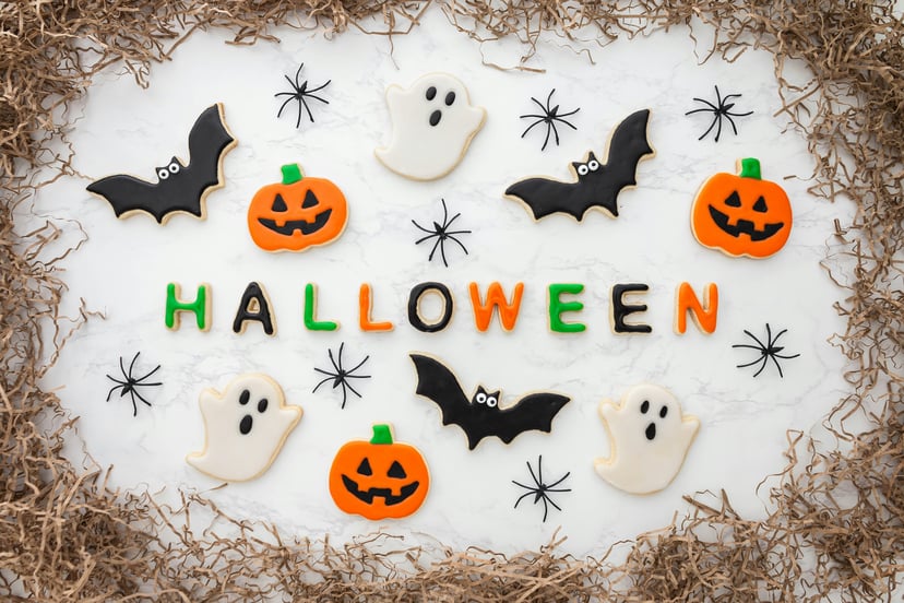Bat, ghost and pumpkin shaped Halloween cookies 