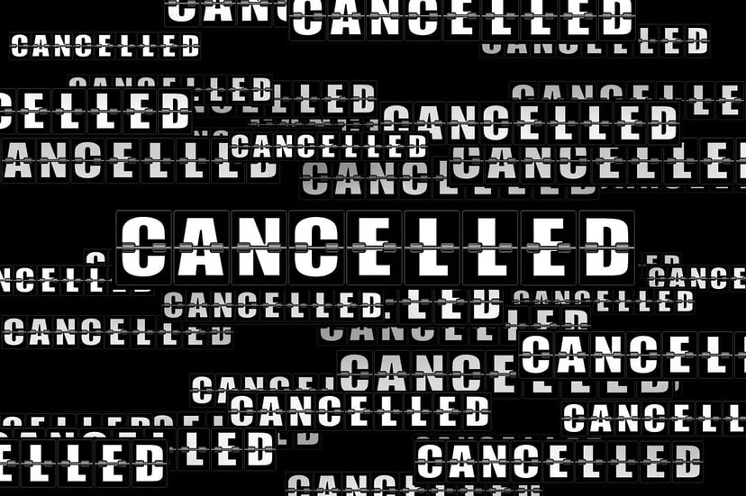Black background with white text saying 'cancelled' multiple times