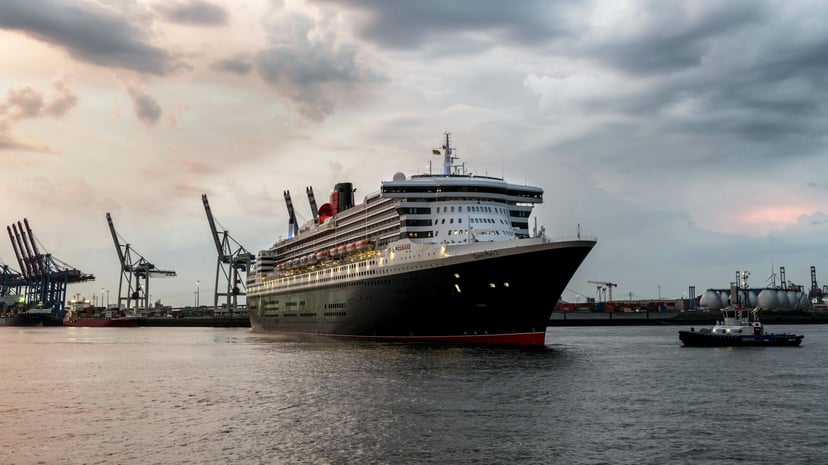 Cunard's Queen Mary 2 cruise ship leaving a port