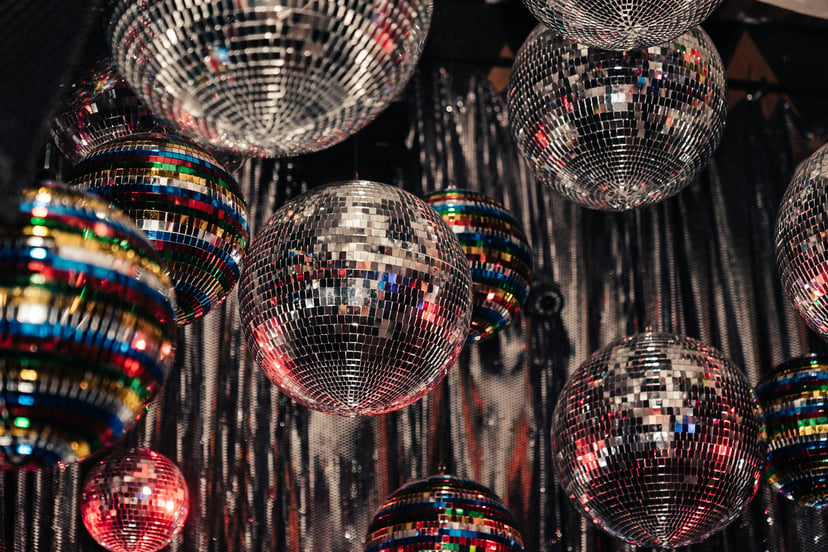 Disco balls hanging from a ceiling