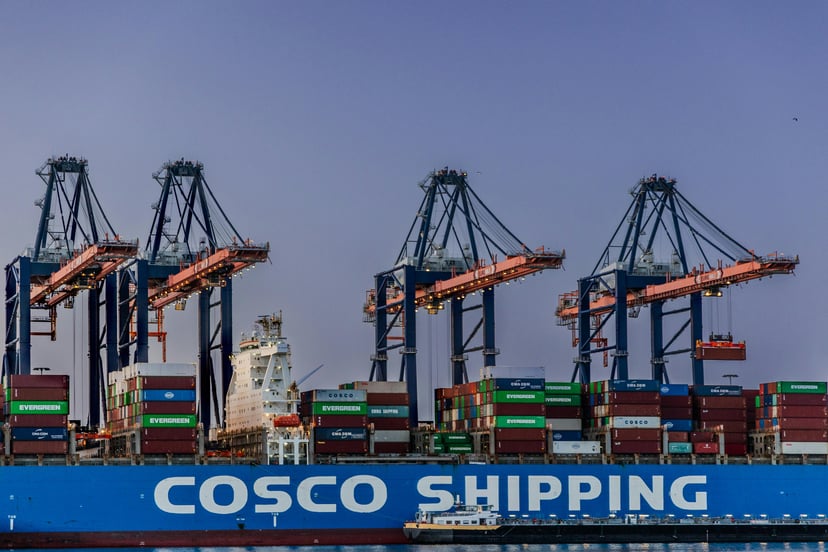 A COSCO Shipping vessel in a port