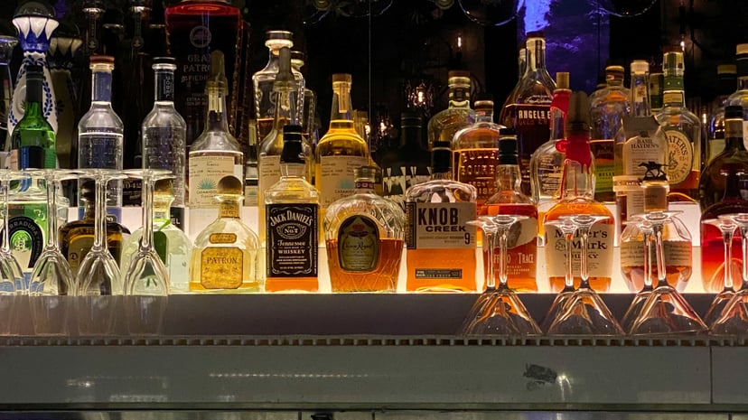 bottles of spirits behind a bar