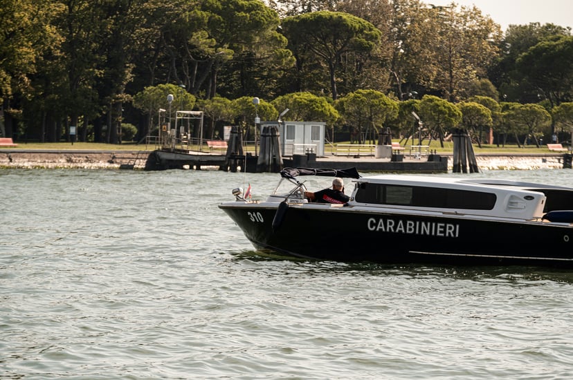 Italian authorities onboard a small Carabinieri boat