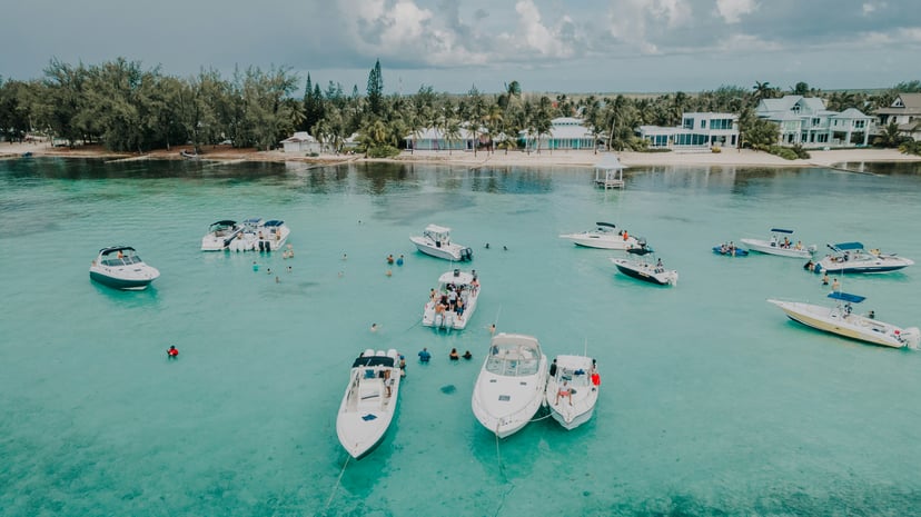 Small boats moored off a beach in the Cayman Islands