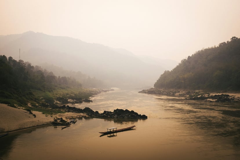 The Mekong River under a hazy sky