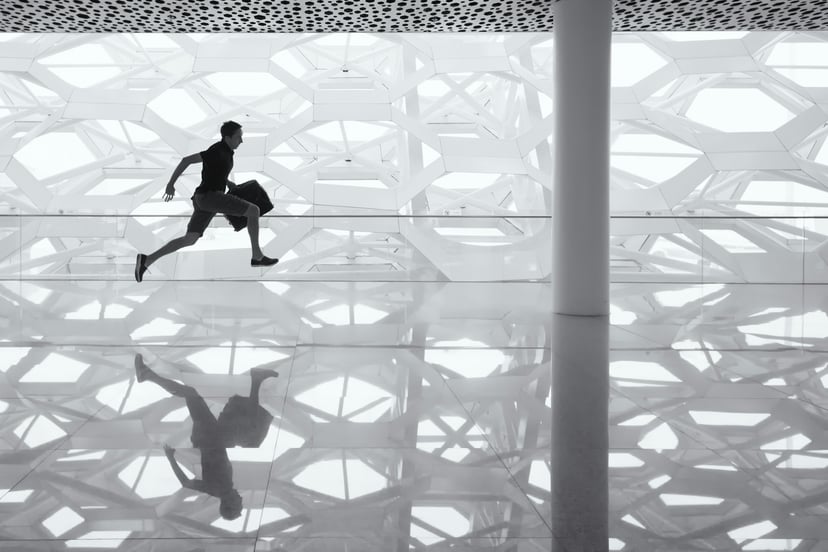 a man running through an airport