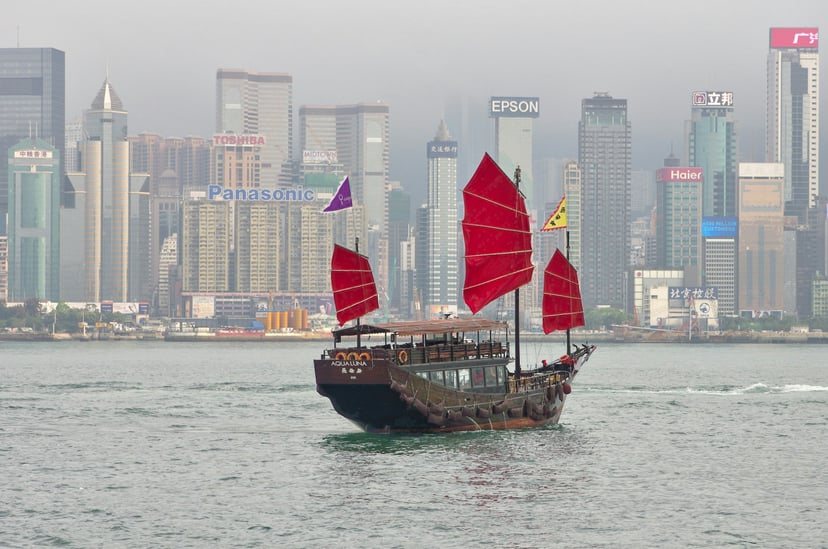 a junk sailing in Victoria Harbor, Hong Kong