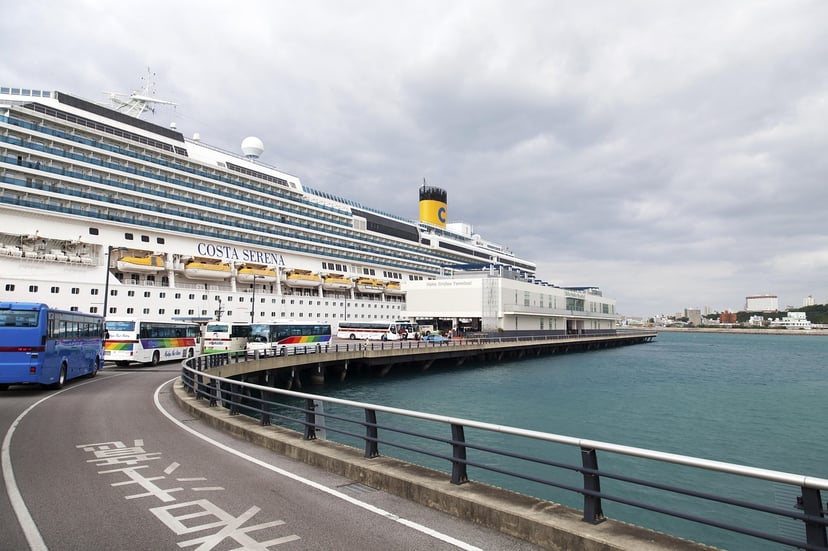 The Costa Serena cruise ship docked in a port